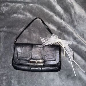 Elegant Black Handbag with Lace Accent